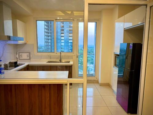 Η κουζίνα ή μικρή κουζίνα στο Montressa Highrise Executive Serviced Apartments Opposite Centaurus Mall Islamabad