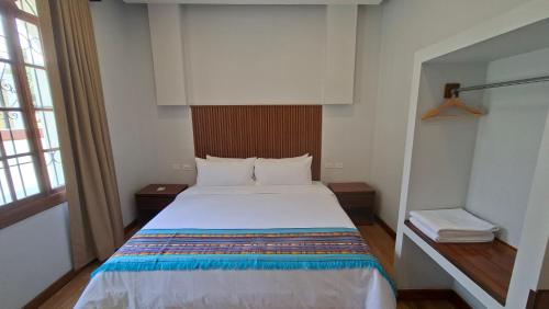 Ένα ή περισσότερα κρεβάτια σε δωμάτιο στο Circasiana Palace Hotel Boutique