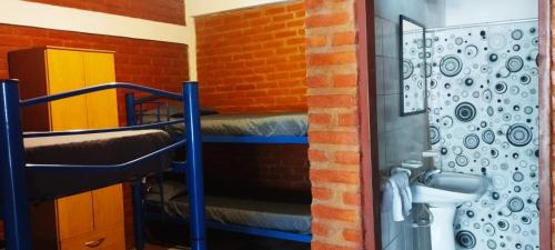Ένα μπάνιο στο Habitación Compartida Tipo Hostel para los más aventureros