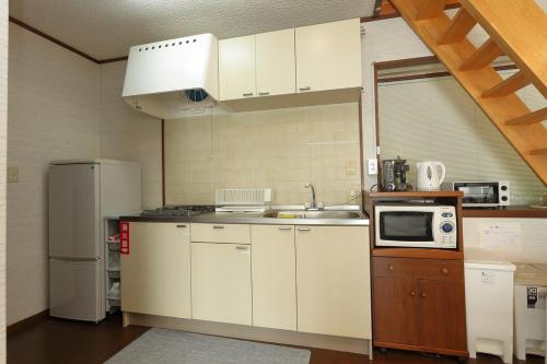 Η κουζίνα ή μικρή κουζίνα στο Anjin Resort House