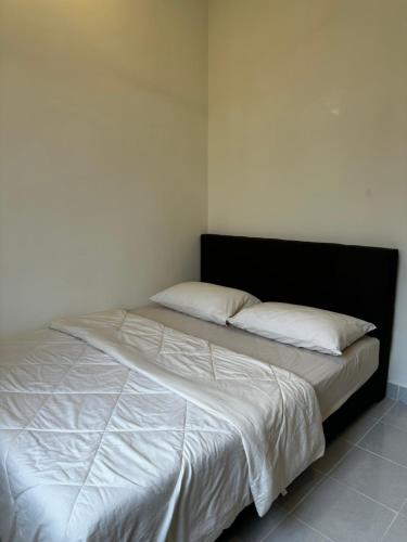 Ένα ή περισσότερα κρεβάτια σε δωμάτιο στο NHI Home Paka