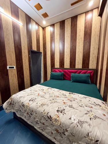 Postel nebo postele na pokoji v ubytování Vedic Villa