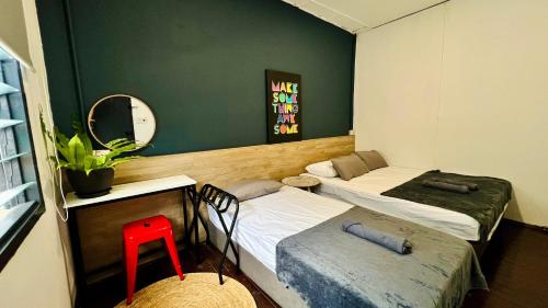 Ένα ή περισσότερα κρεβάτια σε δωμάτιο στο Loft Waterfront Kuching