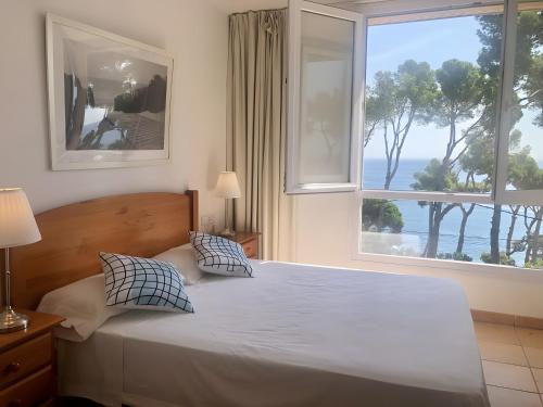 Giường trong phòng chung tại Villa Ona