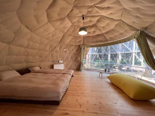 Ένα ή περισσότερα κρεβάτια σε δωμάτιο στο Akagi Tokiwa Forest Campsite - Vacation STAY 84739v