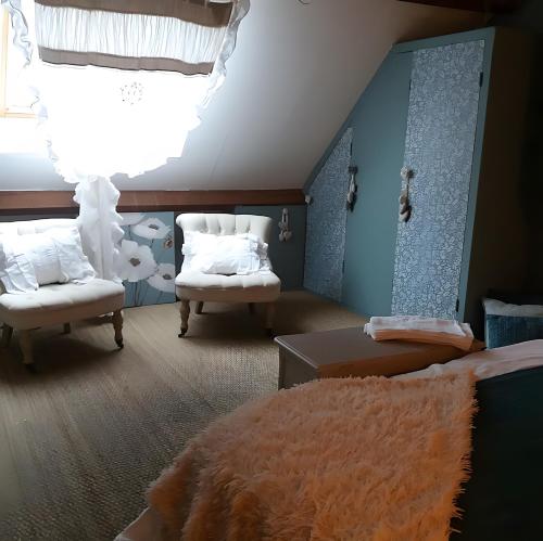 Ένα ή περισσότερα κρεβάτια σε δωμάτιο στο Le Clau Des Cerisiers