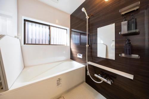 Koupelna v ubytování 桜堂 S-Mark INN