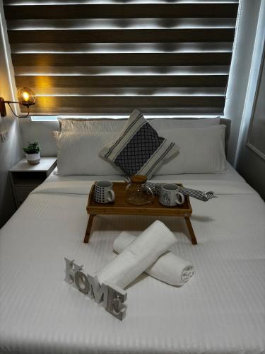 Ένα ή περισσότερα κρεβάτια σε δωμάτιο στο I Simple & Stylish 1BR Living