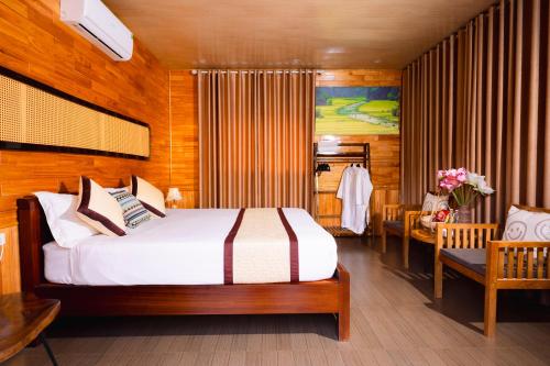 Ένα ή περισσότερα κρεβάτια σε δωμάτιο στο Peaceful Eco Haven Trang An