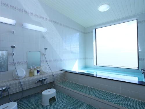 Ένα μπάνιο στο 旅館紀の国