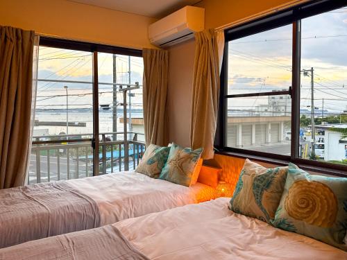 Giường trong phòng chung tại #43 凪-Nagi-