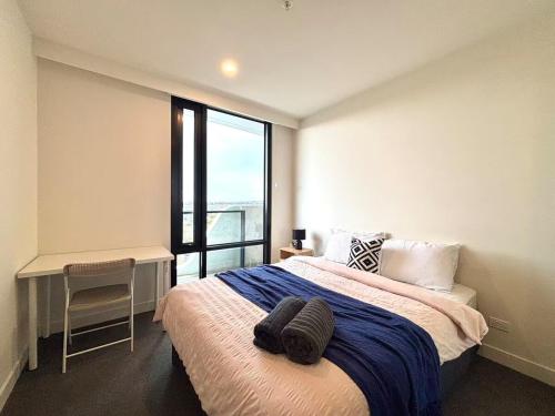 Кровать или кровати в номере M-City Comfort Den near Monash & Hospital