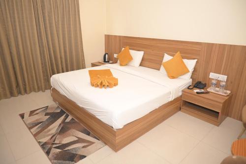 Postel nebo postele na pokoji v ubytování Parmanand Bhawan