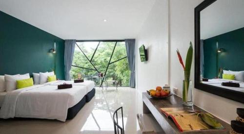 Ένα ή περισσότερα κρεβάτια σε δωμάτιο στο The Forest Home Resort