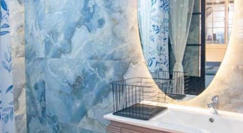 Ένα μπάνιο στο Palm Sweet Hotel