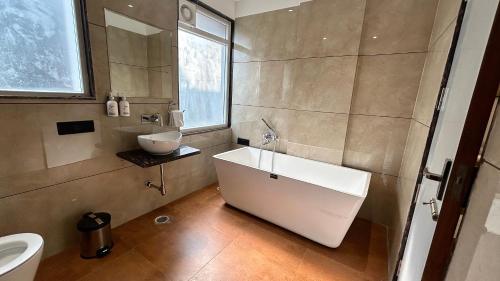 Ένα μπάνιο στο Pravasa Stay, Bapat Square