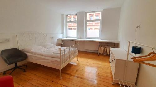 Ένα ή περισσότερα κρεβάτια σε δωμάτιο στο Zimmer im Erdgeschoss