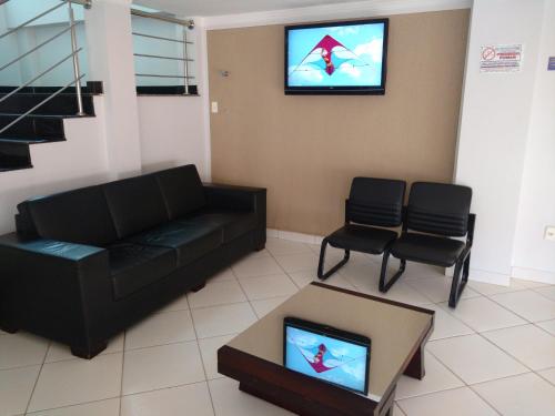 Телевизор и/или развлекательный центр в Euro Plaza Hotel - Próximo ao Aeroporto de Goiânia, Santa Genoveva