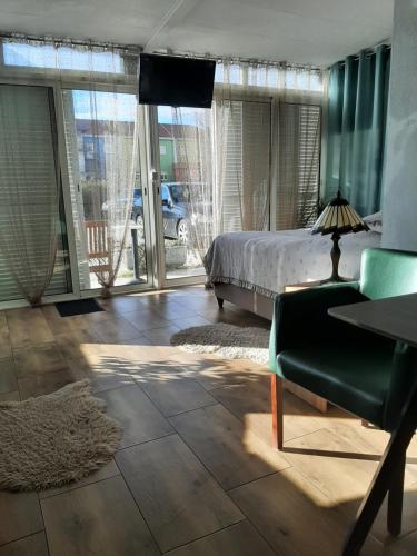 Ένα ή περισσότερα κρεβάτια σε δωμάτιο στο Piccolo