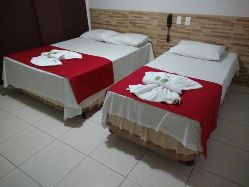 Кровать или кровати в номере Euro Plaza Hotel - Próximo ao Aeroporto de Goiânia, Santa Genoveva