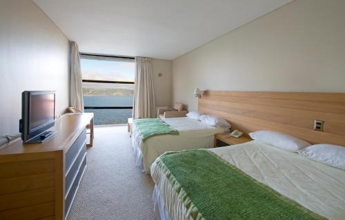 Postel nebo postele na pokoji v ubytování Hotel de Castro