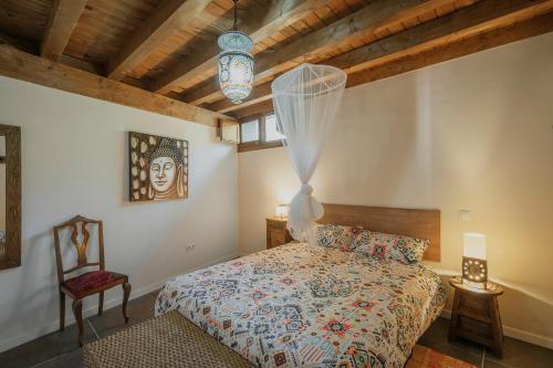 Ένα ή περισσότερα κρεβάτια σε δωμάτιο στο El Astial