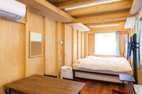 Postel nebo postele na pokoji v ubytování MOBILITA COURT IWATE