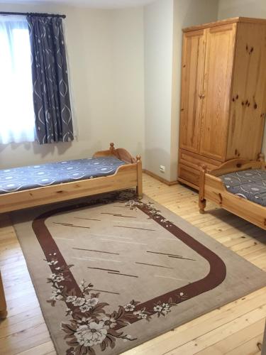 Postel nebo postele na pokoji v ubytování Guest House Mira