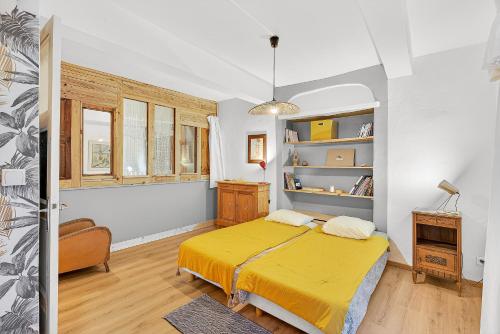 Ένα ή περισσότερα κρεβάτια σε δωμάτιο στο Maison La Placette, Plan D'eau