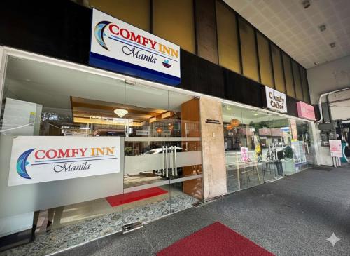 a store front of a company in a mall at Comfy Inn Mabini Manila in Manila