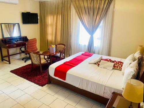 Кровать или кровати в номере D'Villa Guesthouse Airport Junction