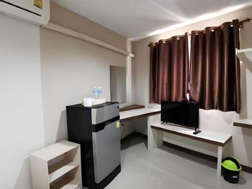 Et tv og/eller underholdning på Poompimaan House