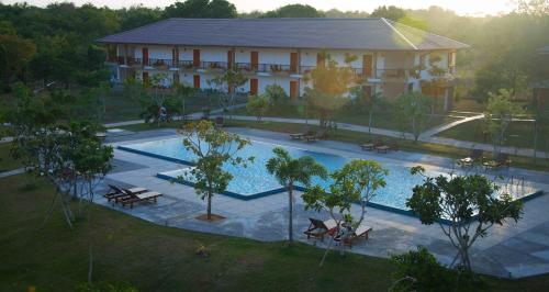 an aerial view of a hotel with a swimming pool at Sungreen Resort Habarana in Habarana