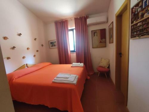 Ένα ή περισσότερα κρεβάτια σε δωμάτιο στο Villa Ada