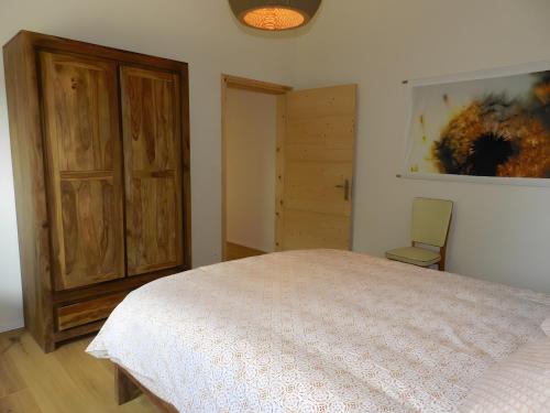 Ένα ή περισσότερα κρεβάτια σε δωμάτιο στο Gite Le Koto