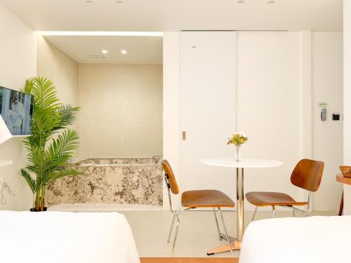 Posezení v ubytování 이루다스테이 호텔 고척돔점