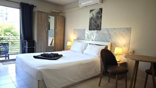 Giường trong phòng chung tại Apartments Kata Beach view garden