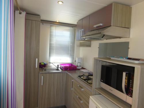 Η κουζίνα ή μικρή κουζίνα στο Camping Mozziconaccio