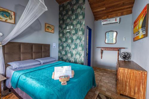 Ένα ή περισσότερα κρεβάτια σε δωμάτιο στο Saracura