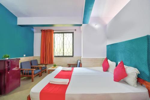 Ένα ή περισσότερα κρεβάτια σε δωμάτιο στο 2bhk Home Stay Calangute