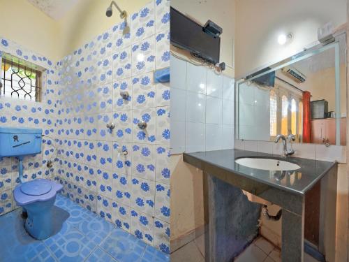 Μια τηλεόραση ή/και κέντρο ψυχαγωγίας στο 2bhk Home Stay Calangute