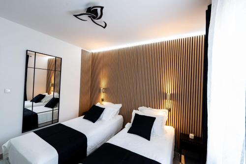 Ένα ή περισσότερα κρεβάτια σε δωμάτιο στο Séjour Professionnel Premium Confort, Fibre & Spa