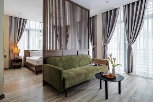 Ένα ή περισσότερα κρεβάτια σε δωμάτιο στο Canary Dalat Hotel