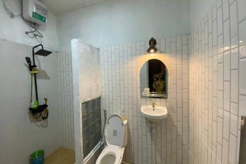 O baie la Capital O 94840 Unihomestay Malioboro Syariah