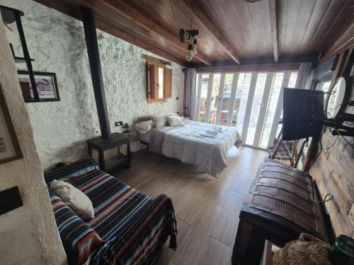 Postel nebo postele na pokoji v ubytování Casas Navalón