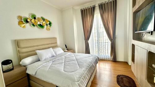 Ένα ή περισσότερα κρεβάτια σε δωμάτιο στο Moses Home