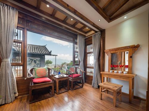 Un lugar para sentarse en Hidden Mountain Boutique Scenic Inn