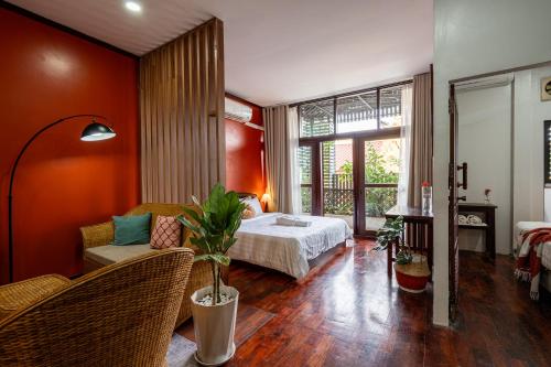 Ένα ή περισσότερα κρεβάτια σε δωμάτιο στο BlueHome