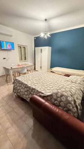 Ένα ή περισσότερα κρεβάτια σε δωμάτιο στο Loft Plaesano