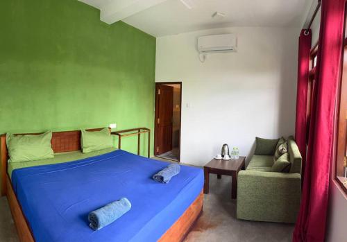 Postel nebo postele na pokoji v ubytování Eros Hotel Villa Green View